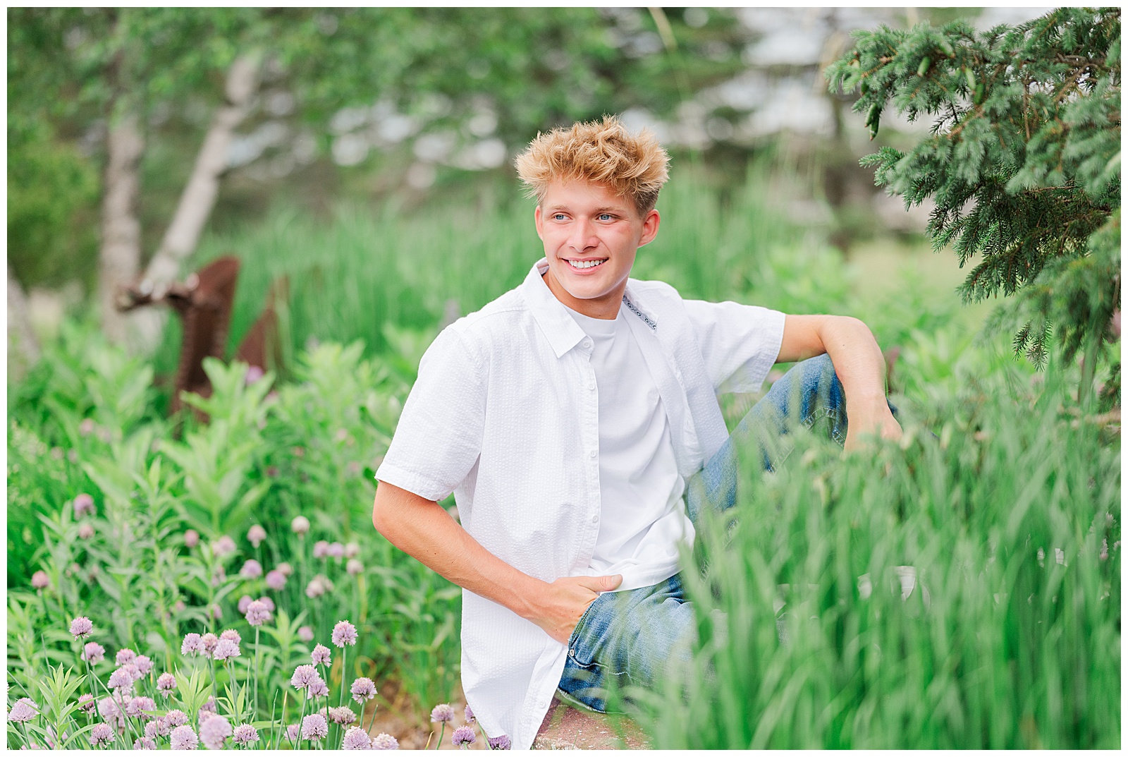 Senior Boy sitting during park senior mini session